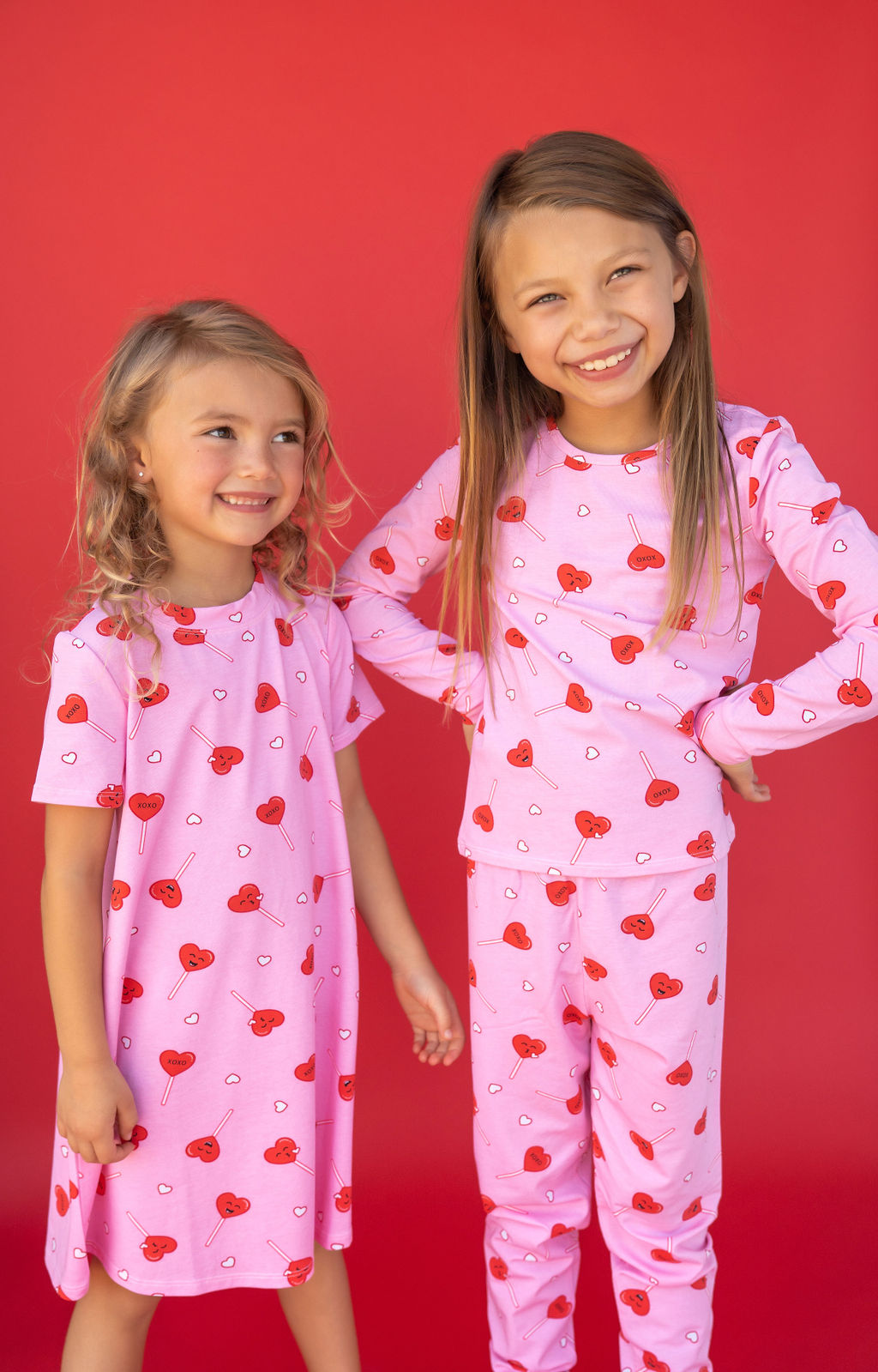 Girl in Heart Pop PJs and another girl in matching dress