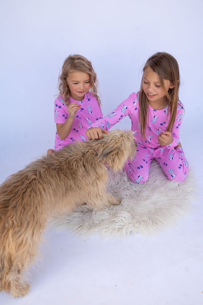 Kids in PJs with dog